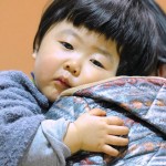 A child who evacuated from the vicinity of Tokyo Electric Power Co's Fukushima Daiichi Nuclear Plant is pictured in Kawamata, Fukushima Prefecture