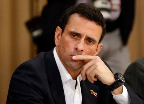 Opposition leader and Governor of Miranda state Henrique Capriles attends a meeting with representatives of the opposition, the Roman Catholic Church and the UNASUR in Caracas