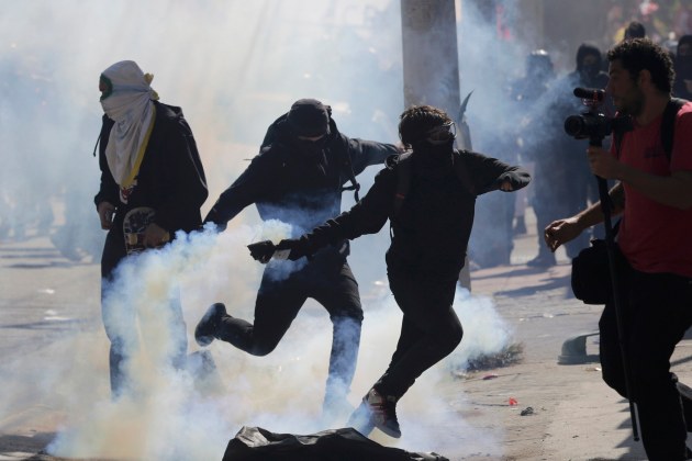 Demonstrators clash with police during a protest against the 2014 World Cup in Sao Paulo