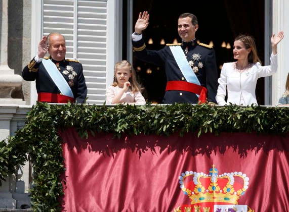 Spain's new King Felipe VI his wife Queen Letizia Princess Sofia Princess Leonor King Juan Carlos and Queen Sofia appear on the balcony of the Royal Palace in Madrid