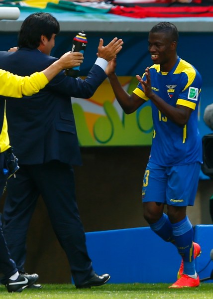 Ecuador's Valencia is congratulated for scoring a goal against Switzerland by his teammates during their 2014 World Cup Group E soccer match at the Brasilia national stadium in Brasilia