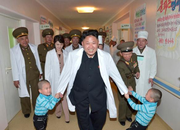 File photo shows North Korean leader Kim Jong un playing with children during a visit to the Taesongsan General Hospital in this undated photo released by North Korea's KCNA agency in Pyongyang