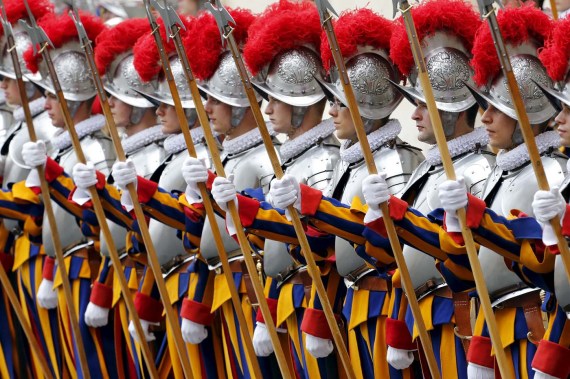 New recruits of the Vatican's elite Swiss Guard stand at attention during the swearing-in ceremony at the Vatican