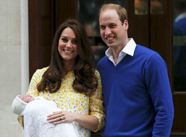 Britain's Prince William and his wife Catherine, Duchess of Cambridge appear with their baby daughter outside the Lindo Wing of St Mary's Hospital in London