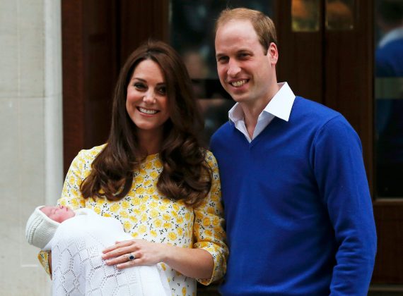 Britain's Prince William and his wife Catherine, Duchess of Cambridge appear with their baby daughter outside the Lindo Wing of St Mary's Hospital in London