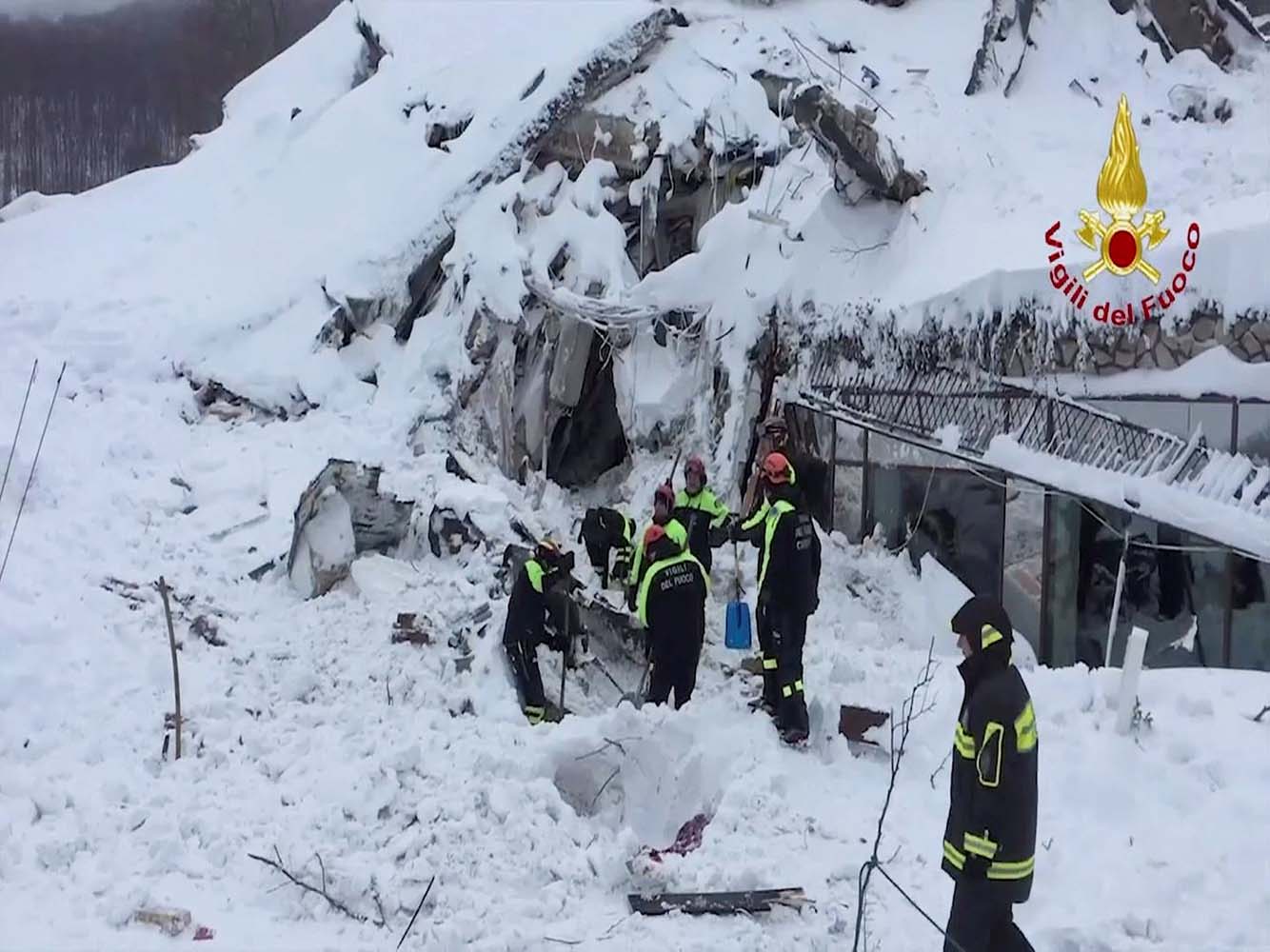 A still image taken from a video shows firefighters working at Hotel Rigopiano in Farindola, central Italy, after it was hit by an avalanche, January 20, 2017 provided by Italy's Fire Fighters.Vigili del Fuoco/Handout via REUTERS   ATTENTION EDITORS - THIS IMAGE WAS PROVIDED BY A THIRD PARTY. EDITORIAL USE ONLY.