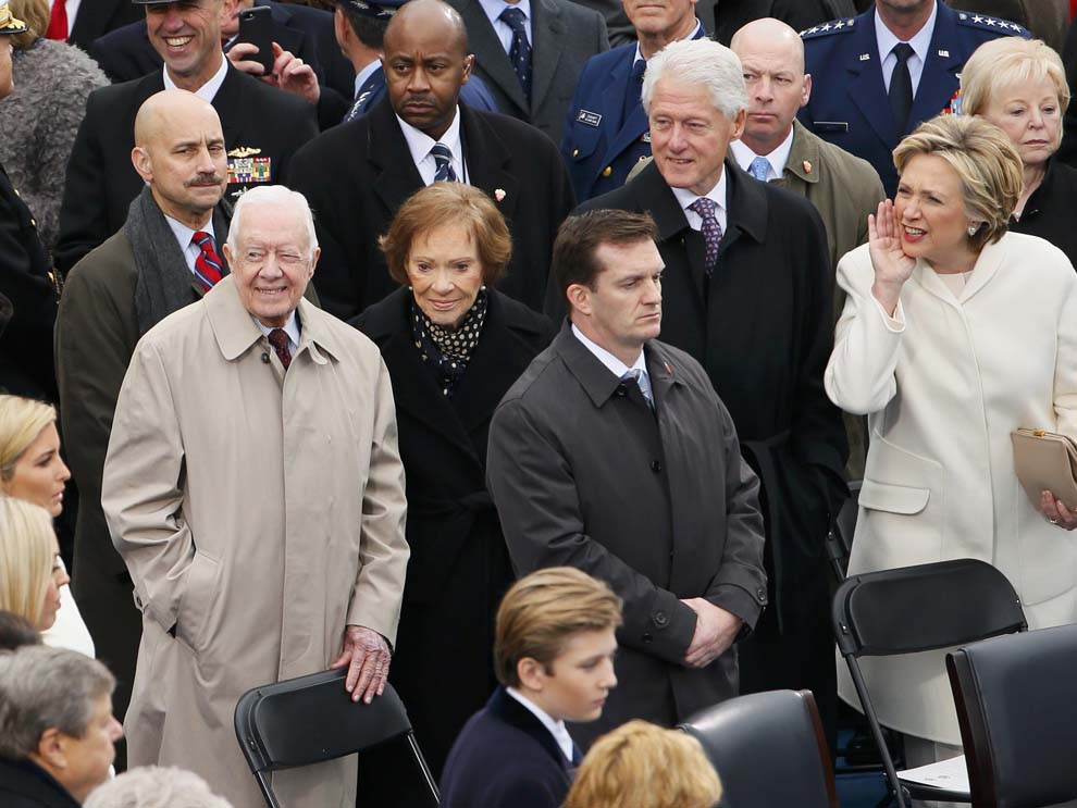 Barron Trump (bottom C) stands near former presidents Jimmy Carter and Bill Clinton during inauguration ceremonies swearing in Donald Trump as the 45th president of the United States on the West front of the U.S. Capitol in Washington, U.S., January 20, 2017. REUTERS/Rick Wilking