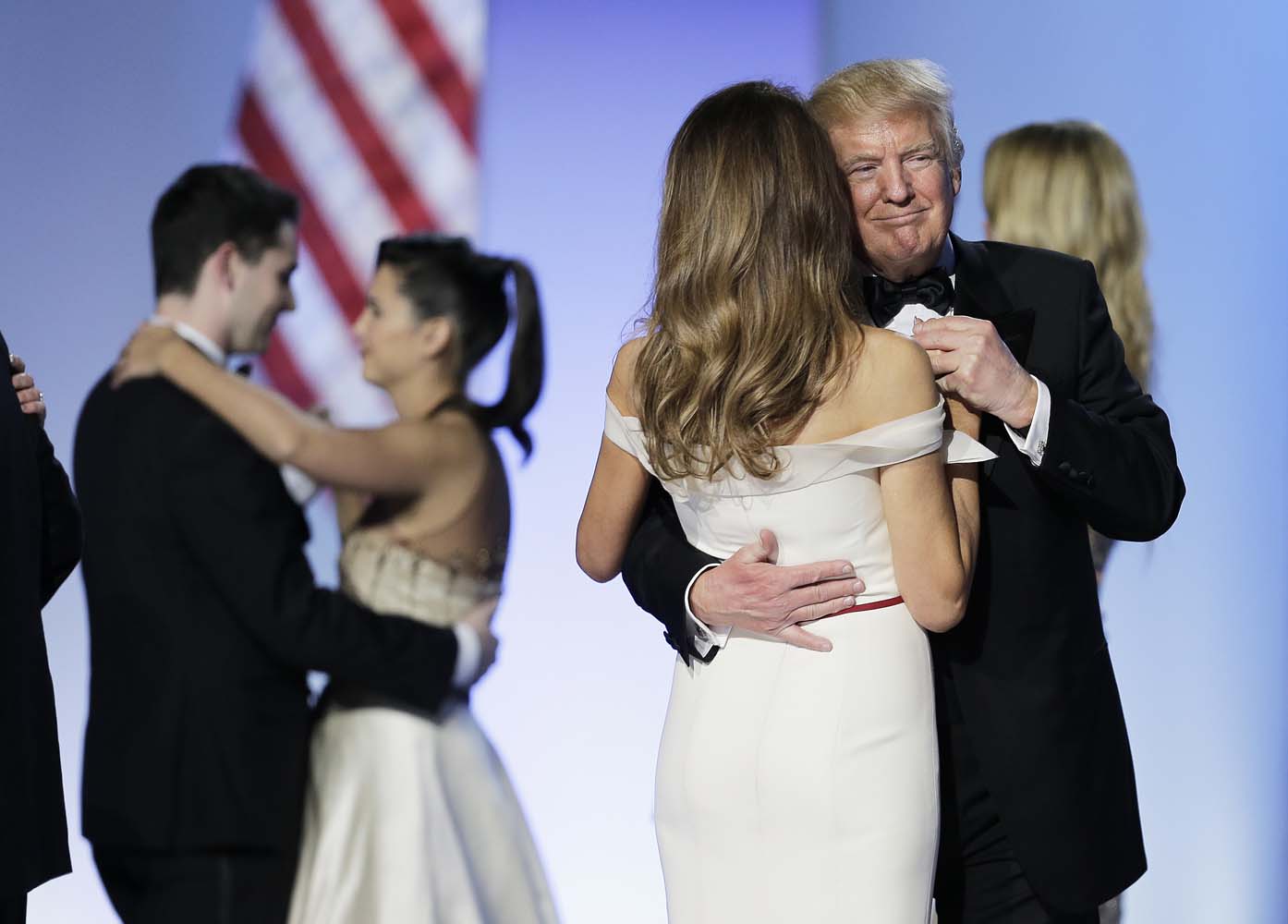 President Donald Trump and first lady Melania dance at the Freedom Ball in Washington, on Friday, Jan. 20, 2017, at the Washington Convention Center during the 58th presidential inauguration . (AP Photo/Mark Tenally)