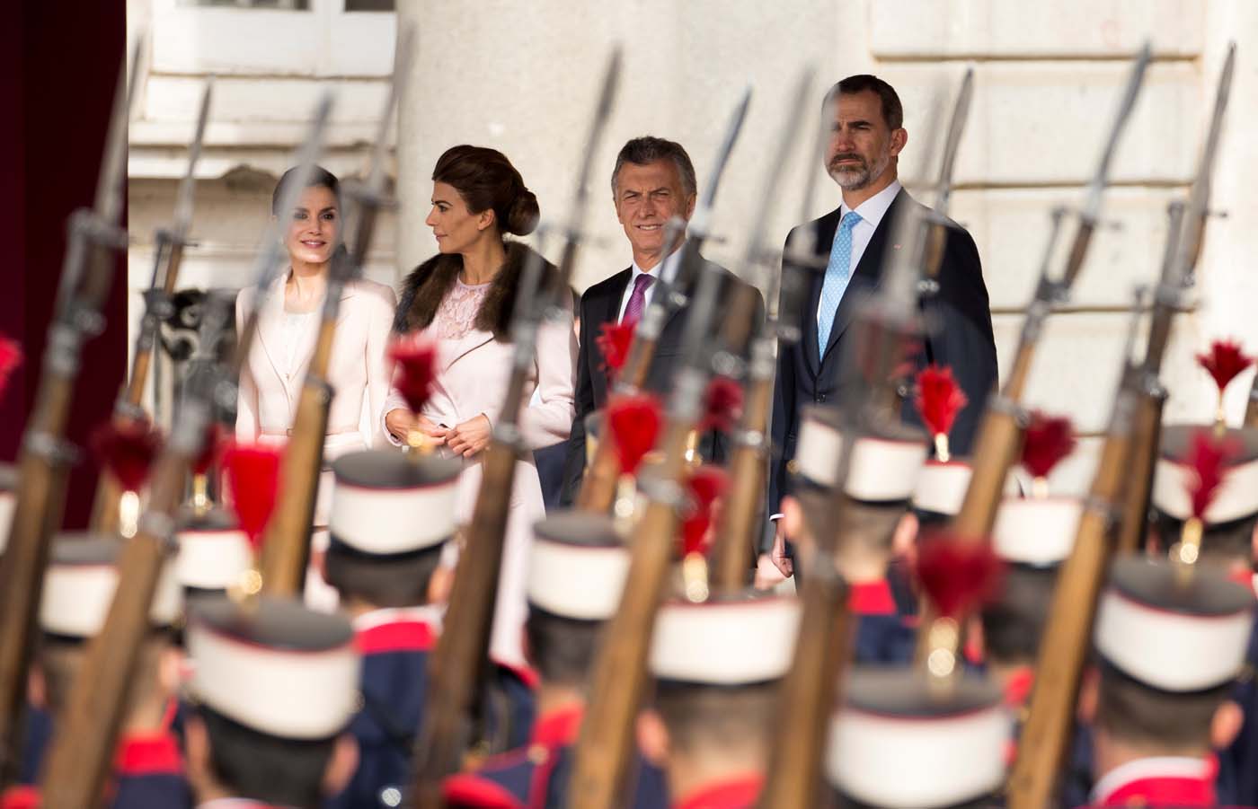 Spain's Queen Letizia, Argentina's first lady Juliana Awada, Argentina's President Mauricio Macri and Spain's King Felipe (L-R) attend a military parade during the welcoming ceremony at Royal Palace in Madrid, Spain February 22, 2017. REUTERS/Sergio Perez