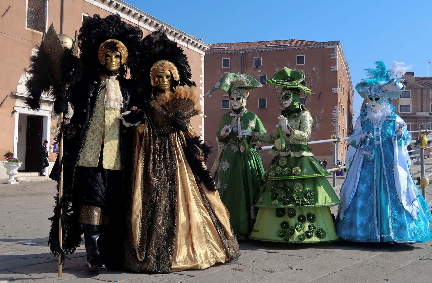 Masked revellers pose during the Venice Carnival in Venice, Italy February 20, 2017. REUTERS/Fabrizio Bensch