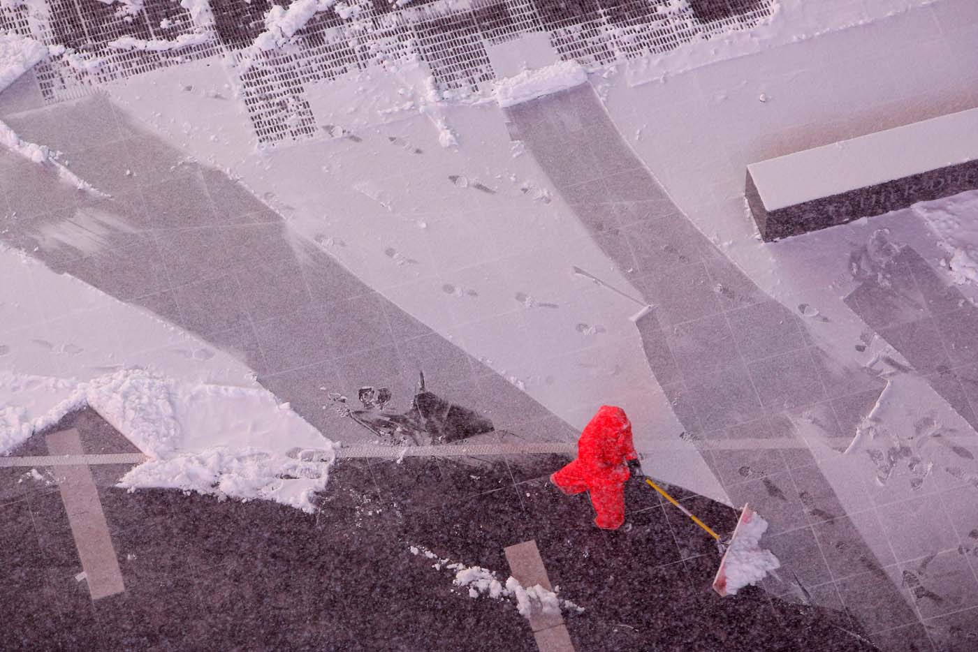 A worker clears snow in Times Square during a snow storm in Manhattan, New York, U.S., March 14, 2017. REUTERS/Andrew Kelly