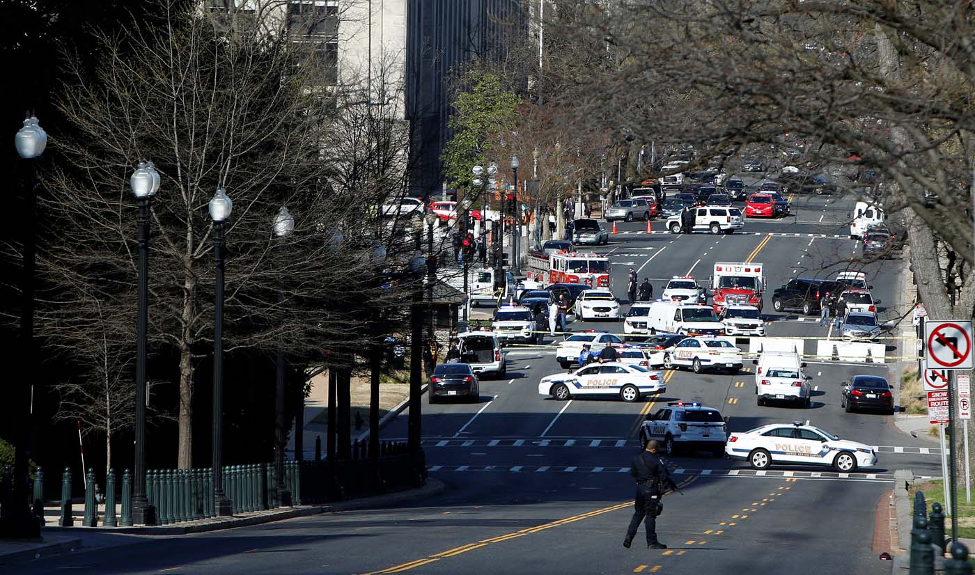 Capitol Hill police block traffic after a car whose driver struck a Capitol Police cruiser and then tried to run over officers, near the U.S. Capitol in Washington, U.S., March 29, 2017. REUTERS/Joshua Roberts