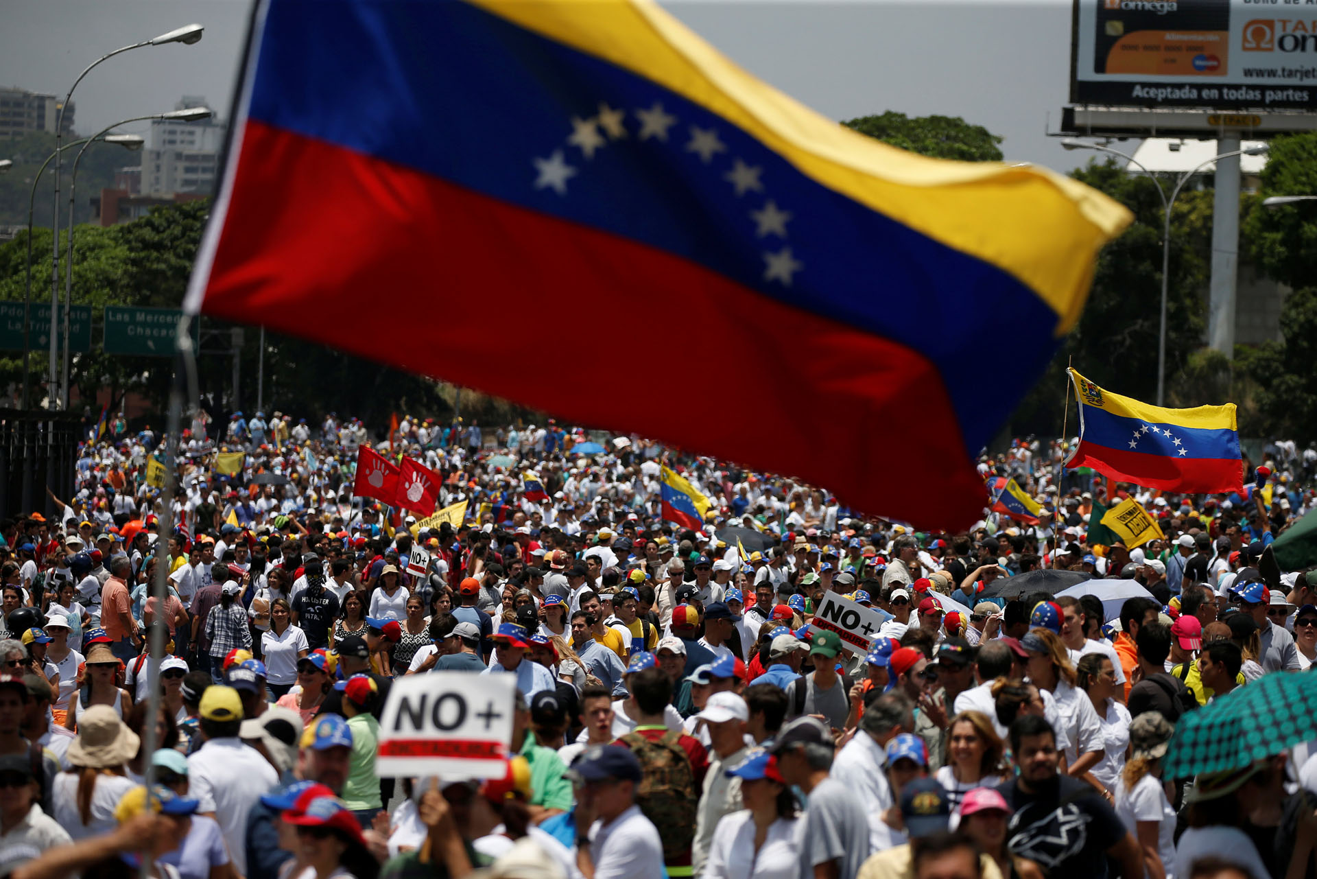 Demonstrators march during an opposition rally in Caracas, Venezuela April 6, 2017. REUTERS/Carlos Garcia Rawlins