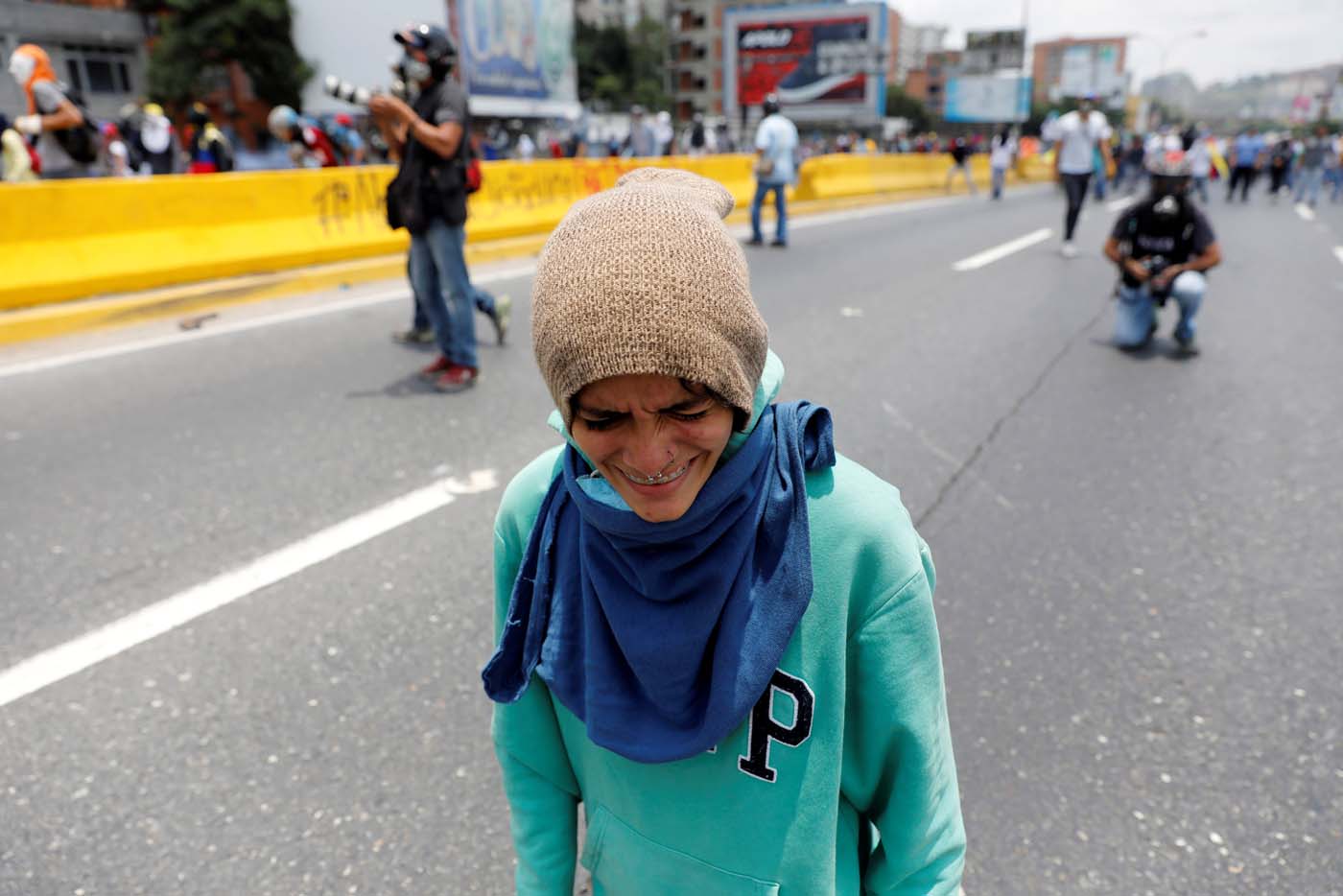 A demonstrator rallies against Venezuela's President Nicolas Maduro's government in Caracas, Venezuela April 10, 2017. REUTERS/Carlos Garcia Rawlins