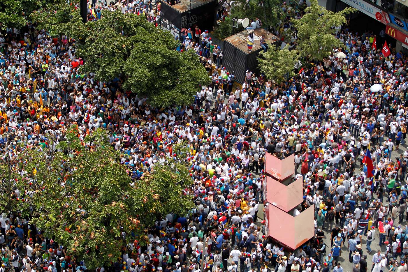 Demonstrators rally against Venezuela's President Nicolas Maduro's government in Caracas, Venezuela April 10, 2017. REUTERS/Christian Veron