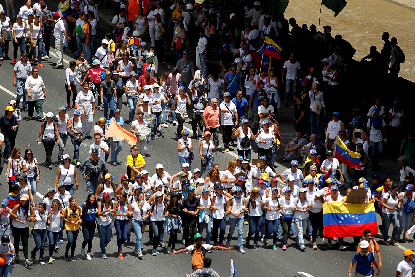 Demonstrators attend a women's march to protest against President Nicolas Maduro's government in Caracas, Venezuela May 6, 2017. REUTERS/Christian Veron