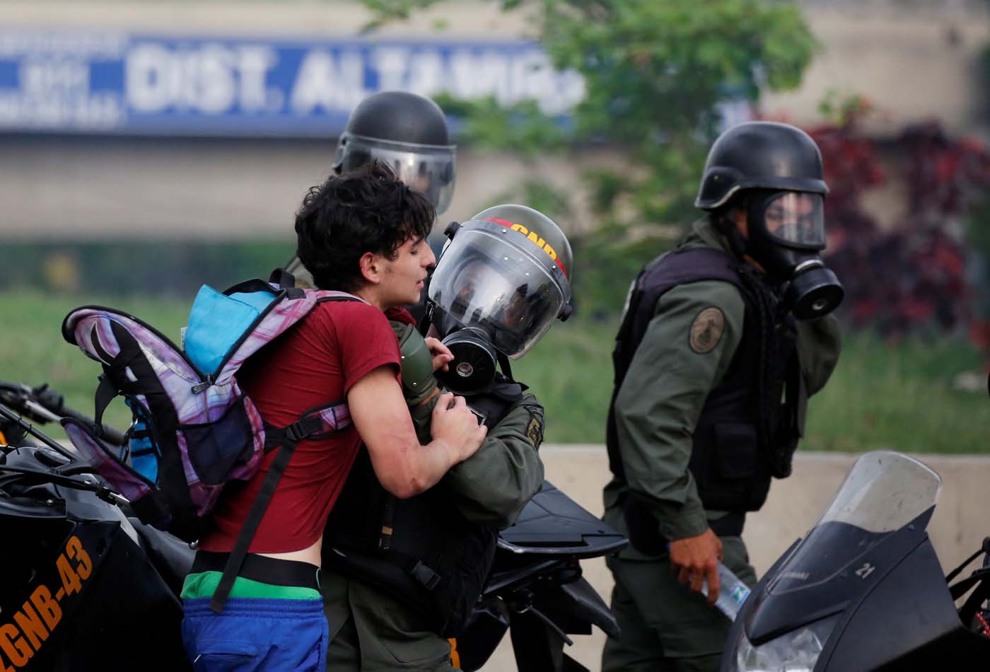 An opposition supporter is detained by riot police during a rally against Venezuelan President Nicolas Maduro in Caracas, Venezuela, May 8, 2017. REUTERS/Carlos Garcia Rawlins