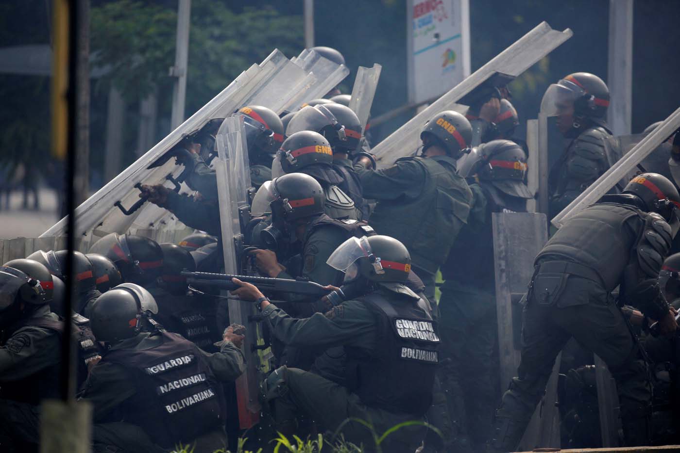 Riot security forces take position while clashing with demonstrators rallying against President Nicolas Maduro in Caracas, Venezuela, May 24, 2017. REUTERS/Carlos Barria