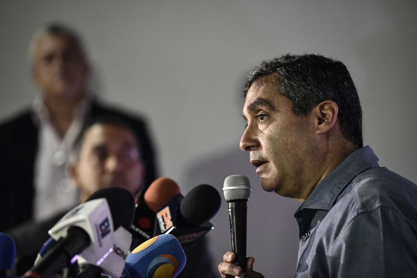 Venezuela's former intelligence chief (1999-2013) and Interior and Justice Minister (2013-2014), retired general Miguel Rodriguez, speaks during a press conference in Caracas on June 27, 2017 in which he denied accusations by President Nicolas Maduro of his involvement in an alleged coup plot to promote a US military intervention. A political and economic crisis in the oil-producing country has spawned often violent demonstrations by protesters demanding President Nicolas Maduro's resignation and new elections. The unrest has left 76 people dead since April 1. / AFP PHOTO / CARLOS BECERRA