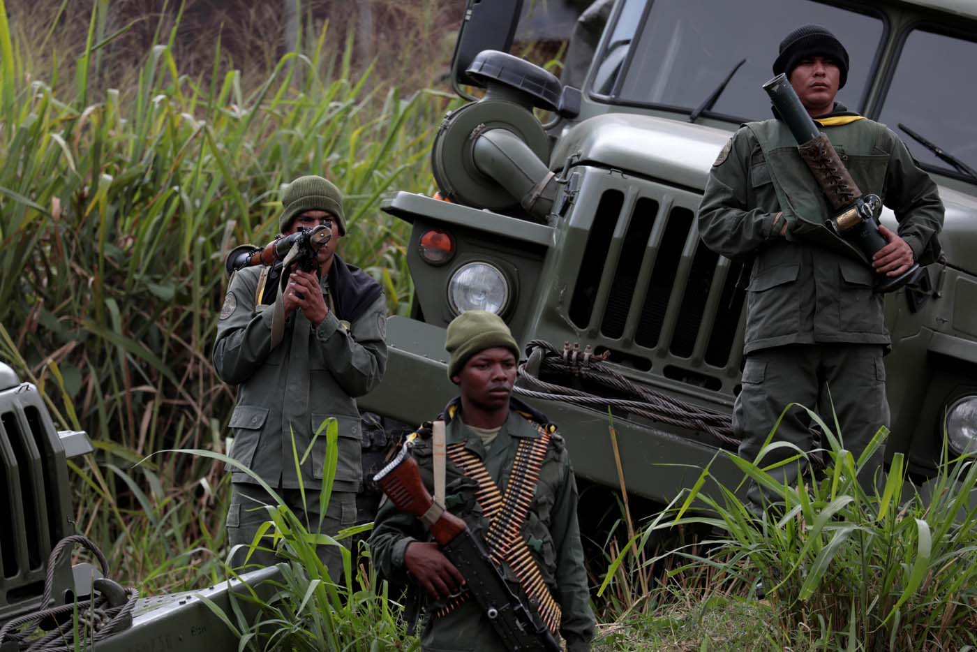 Members of the National Bolivarian Armed Forces attend a news conference by Admiral-in-Chief Remigio Ceballos, Strategic Operational Commander of the Bolivarian National Armed Forces, during military exercises at Fuerte Tiuna Military Base in Caracas, Venezuela August 25, 2017. REUTERS/Marco Bello