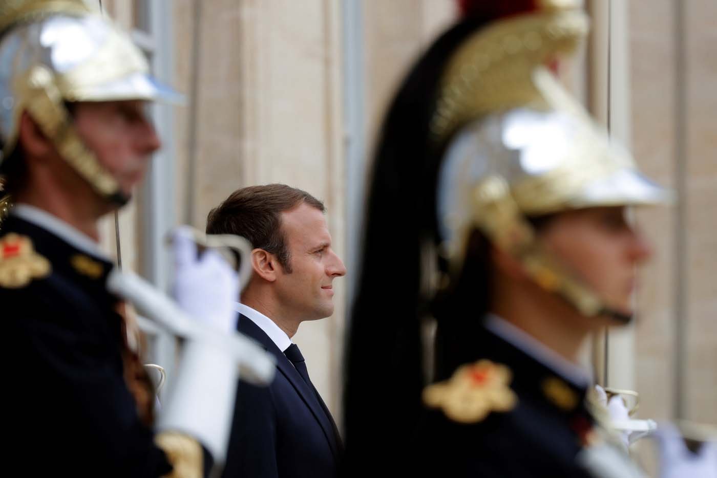 French President Emmanuel Macron waits for guests at the Elysee Palace in Paris, France, August 31, 2017. REUTERS/Philippe Wojazer