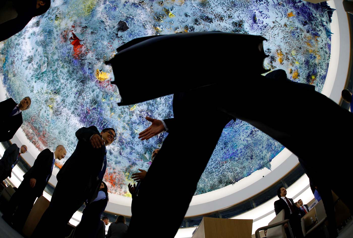 Delegates arrive for the 36th Session of the Human Rights Council at the United Nations in Geneva, Switzerland September 11, 2017. Picture taken with a fisheye lens.  REUTERS/Denis Balibouse