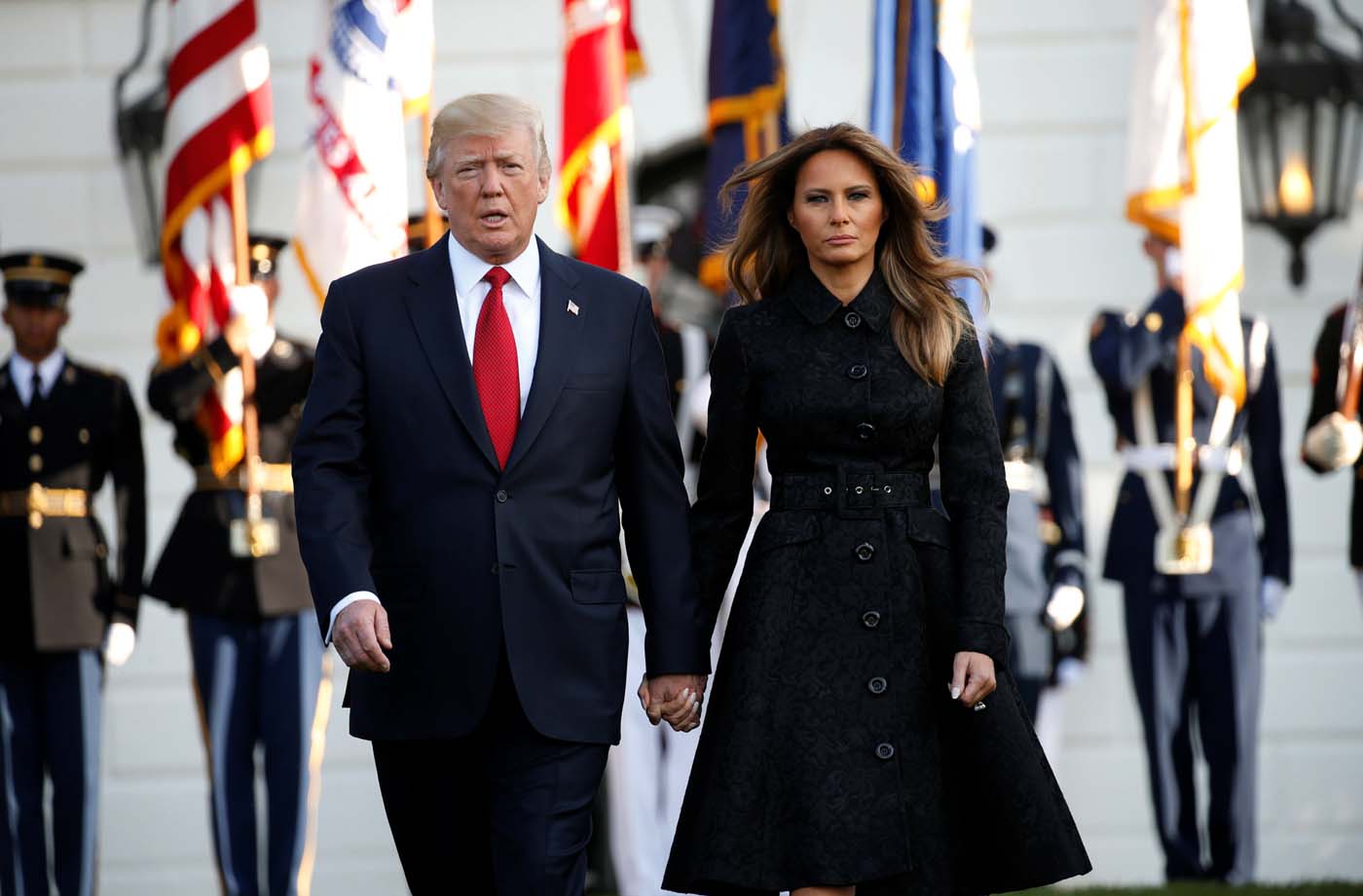 U.S. President Donald Trump and first lady Melania Trump arrive to observe a moment of silence in remembrance of those lost in the 9/11 attacks at the White House in Washington, U.S. September 11, 2017. REUTERS/Kevin Lamarque