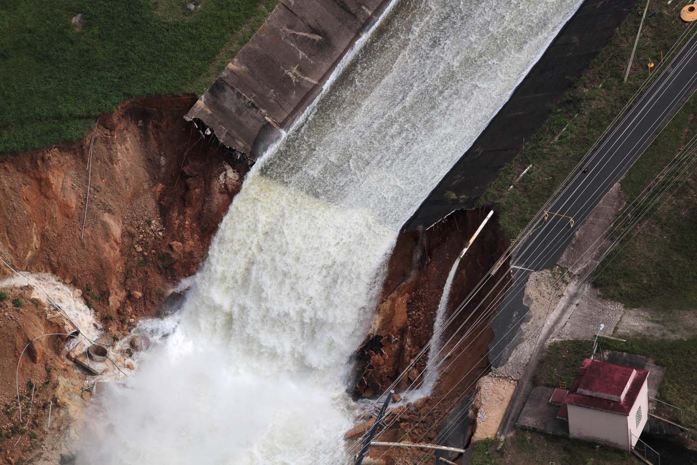 An aerial view shows the damage to the Guajataca dam in the aftermath of Hurricane Maria, in Quebradillas, Puerto Rico September 23, 2017. REUTERS/Alvin Baez