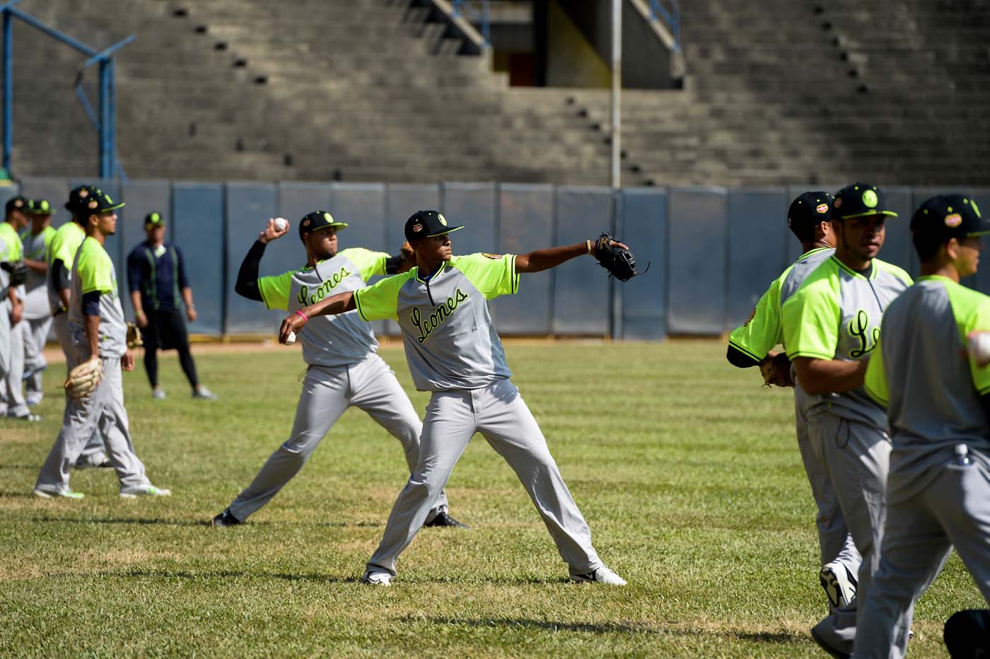 Players of the Venezuelan baseball team Leones del Caracas attend a training session at the Universitario stadium in Caracas, on September 18, 2017. While baseball is Venezuela's national sport, some fans are angry that the government, given the severity of the economic crisis and the political tension, will spend nearly ten million dollars on organizing the upcoming Winter League rather than on imports of food and medicine. / AFP PHOTO / FEDERICO PARRA