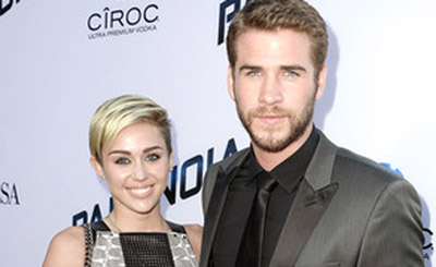 Miley Cyrus acompañó a Liam Hemsworth en la premiere de Paraonia (FOTO)