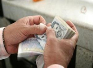 Acuerdan salario mínimo para 2014 en 321 dólares mensuales en Colombia