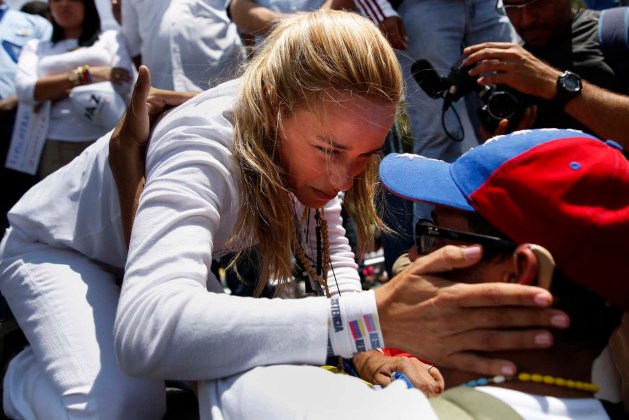 Lilian Tintori, wife of jailed opposition leader Leopoldo Lopez, greets a supporter during a rally in support of him in Los Teques