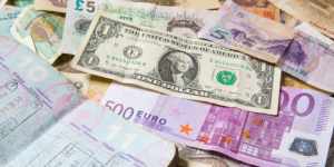 World currencies - including US Dollars, Euros, Chinese Yuan, British Pounds