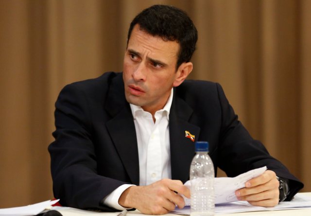 Opposition leader and Governor of Miranda state, Henrique Capriles, attends a meeting with Venezuela's President Nicolas Maduro at Miraflores Palace in Caracas