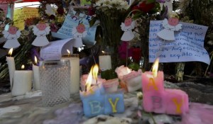 Santos encabeza sepelio de niños que murieron calcinados