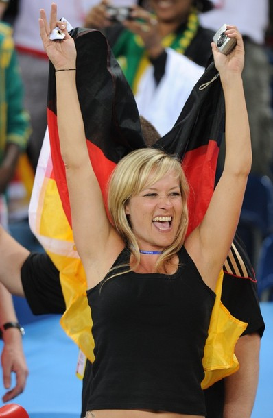 A supporter of Germany celebrates after