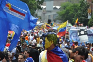 FOTOS: Marchas del Día del Trabajador dividen nuevamente a Venezuela