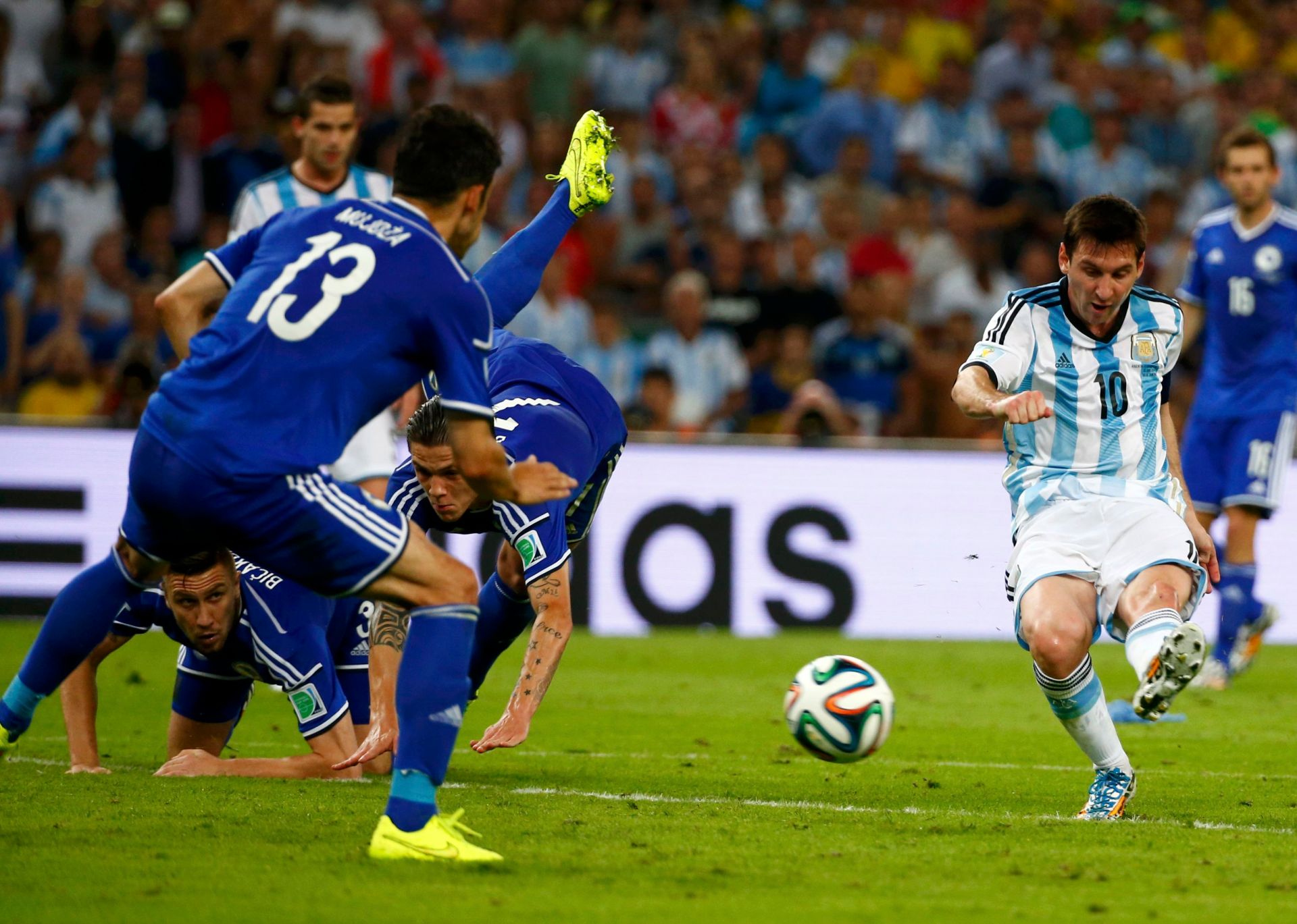 Argentina's Lionel Messi scores a goal during the 2014 World Cup Group