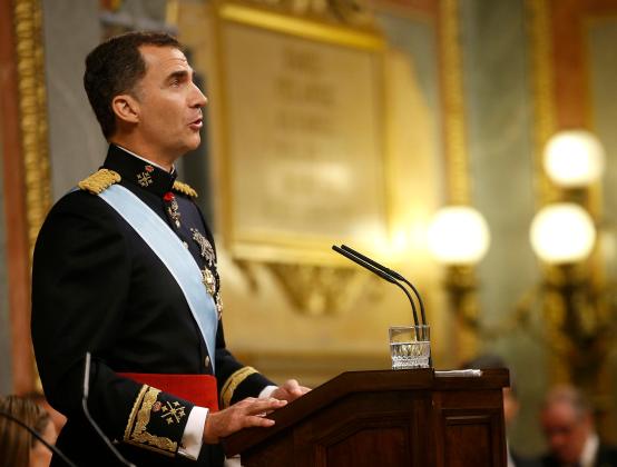 Spain's new King Felipe VI delivers his speech as he attends his swearing-in ceremony at the Congress of Deputies in Madrid