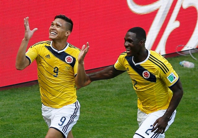 Colombia's Gutierrez celebrates with teammate Zapata after scoring against Greece during their 2014 World Cup Group C soccer match at the Mineirao stadium in Belo Horizonte