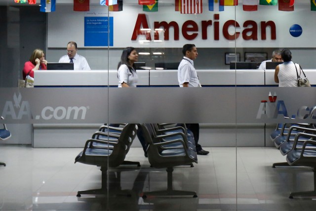 Customers are attended to at the American Airlines office in Caracas