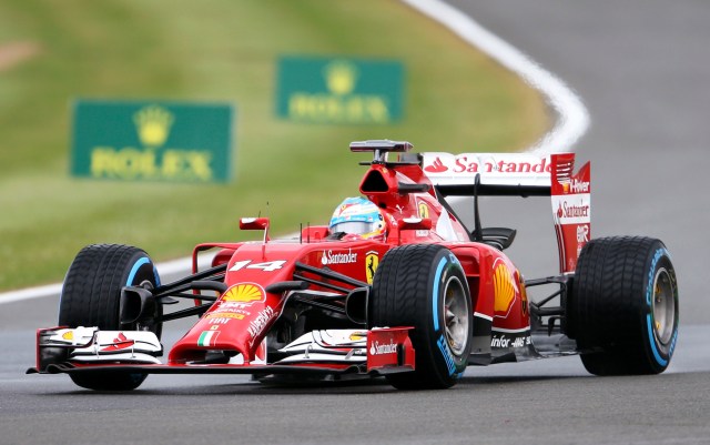 Ferrari Formula One driver Alonso of Spain races during the final practice session ahead of the British Grand Prix at the Silverstone Race circuit