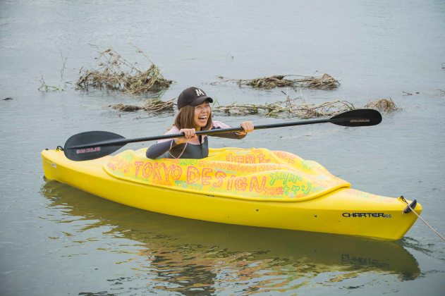 Japanese artist Megumi Igarashi, known as Rokudenashiko, paddles in her kayak modeled on her vagina in the Tama river in Tokyo