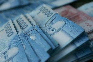Chile eleva salario mínimo a 406 dólares mensuales