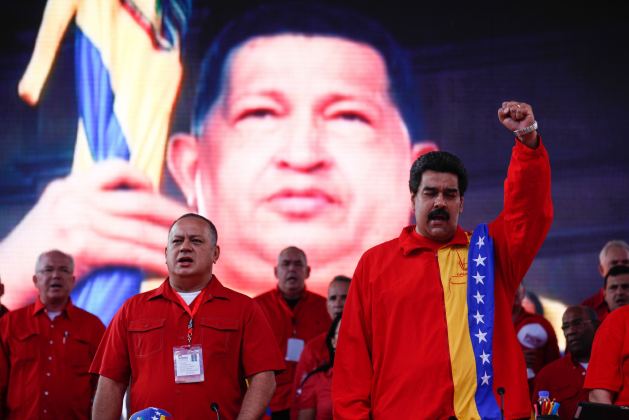 Handout picture of Maduro and Cabello singing the national anthem during the closing of the United Socialist party congress in Caracas