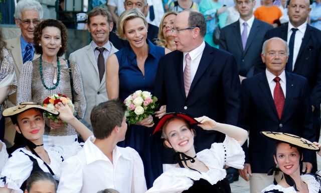 Prince Albert II of Monaco and his wife Princess Charlene arrive to take part in the traditional "Pique Nique Monegasque" in Monaco