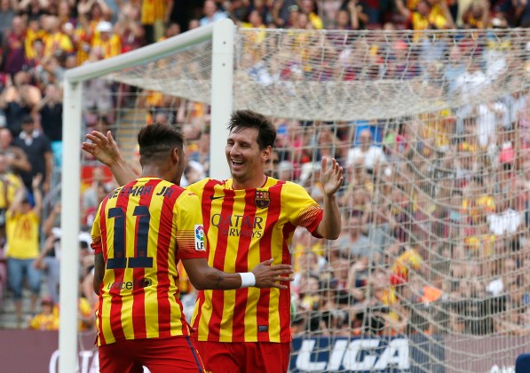Barcelona's Neymar celebrates his second goal against Athletic with team mate Messi during their Spanish first division soccer match in Barcelona