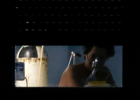 Teresa Romero, the Spanish nurse who contracted Ebola, is seen inside her room at an isolation ward on the sixth floor at Madrid's Carlos III Hospital