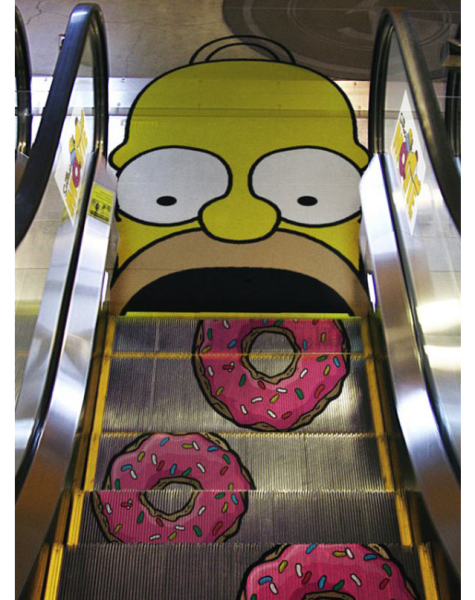 Promoting-the-Simpsons-movie-by-making-Homers-fantasy-of-devouring-infinite-donuts-a-reality