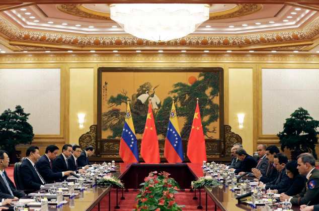 Venezuela's President Maduro speaks during a bilateral meeting with China's President Xi at the Great Hall of the People in Beijing